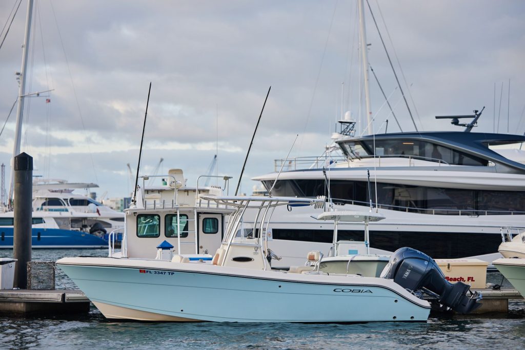 Several boats docked at a marina. 