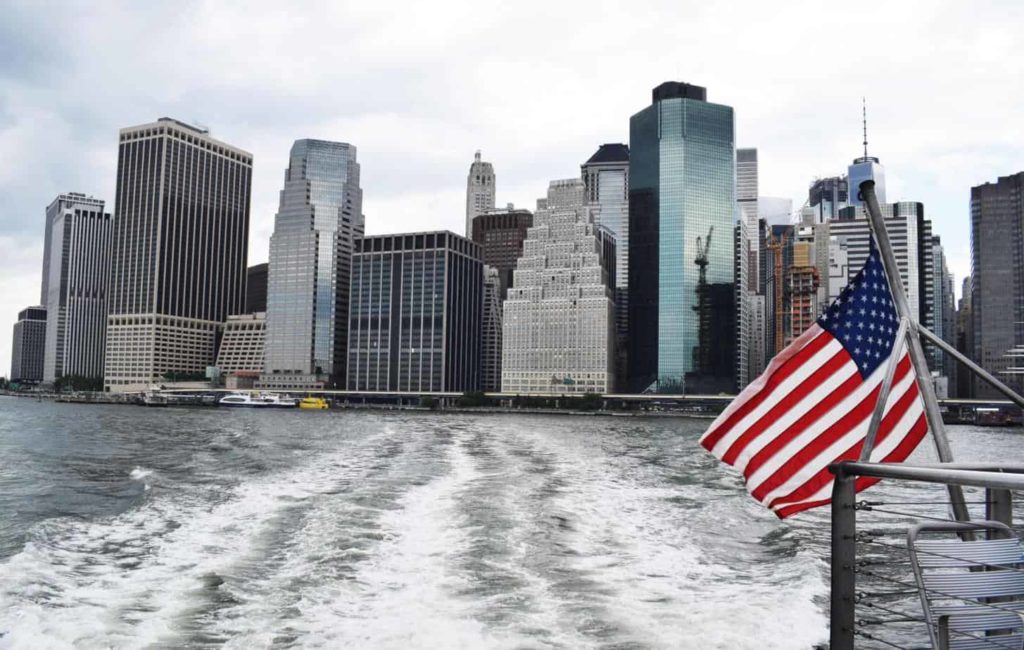 Looking at the NYC skyline from a boat, New York boating concept. 