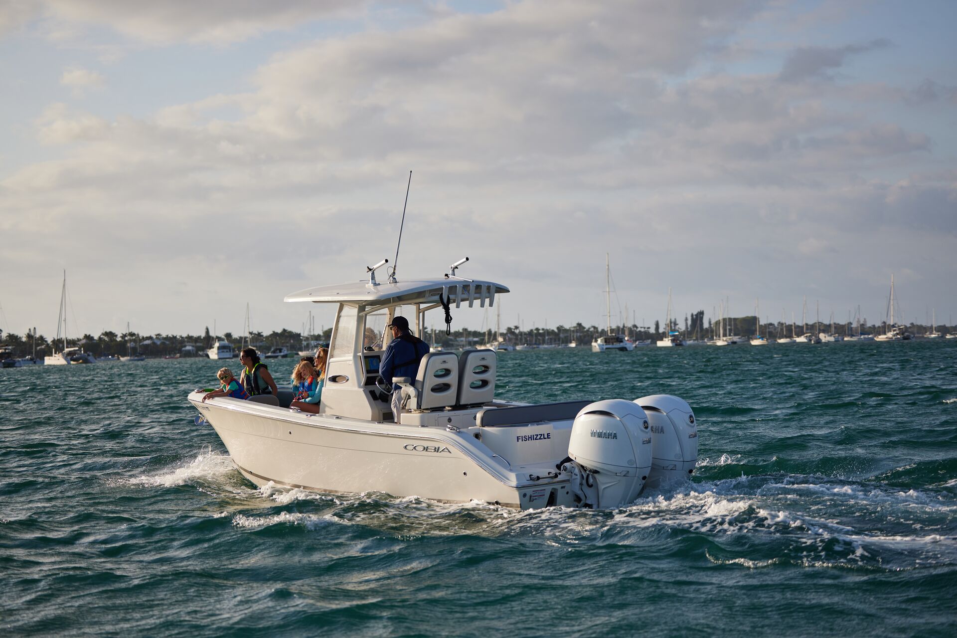 People on a boat on the water, boaters protecting manatees concept. 