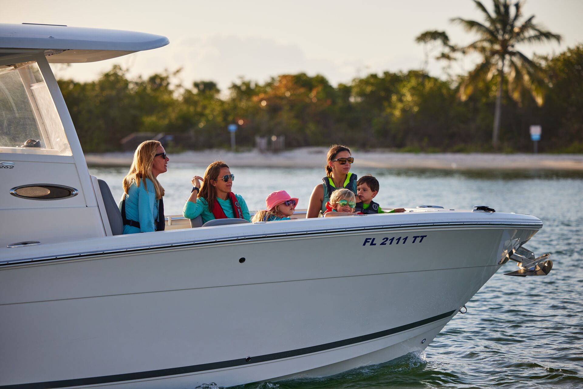 Boaters wearing life jackets. 