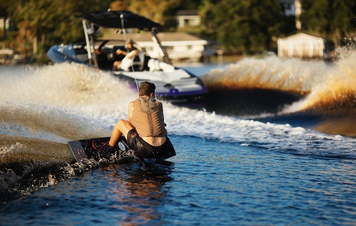 A man on a wakeboard.