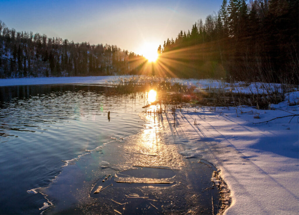 Ice on a lake, winterizing a boat concept.